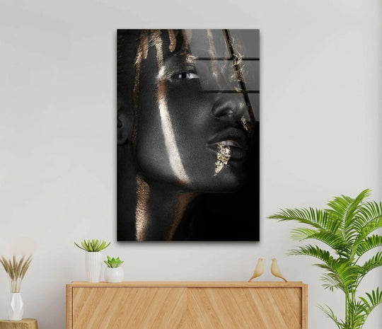 Gold Woman Portrait glass wall art with streaks of golden light flowing like liquid, suggesting dynamic movement.