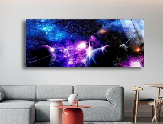 Striking color contrast defines this purple galaxy with planets glass wall artwork, showcasing the vivid blues, purples, and radiant bursts of light across the cosmic scene.