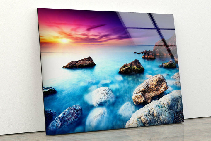 Waves Crashing Against Coastal Rocks at Dusk – A Beautiful Glass Wall Print
