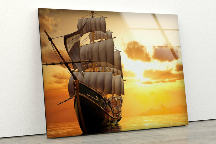 Golden sunset over the ocean, illuminating a grand sailing ship in this elegant wall art piece.
