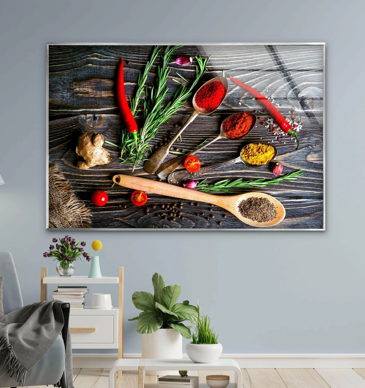Vibrant red chili peppers are the loudest element in this hot spices kitchen tempered glass wall art, showcasing an arrangement of colorful spices and herbs.