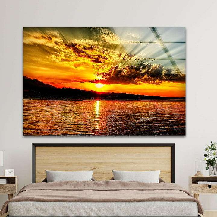 Golden Rays Over the Sea: A warm sunset casting golden rays across the peaceful ocean.
