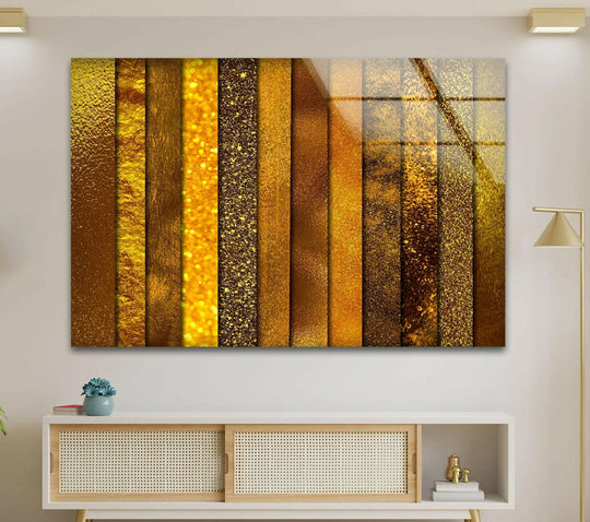 A unique modern wall decor featuring dominant shades of rich gold and deep brown abstract panels.