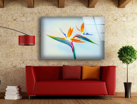 Strelitzia flower glass art showcases vibrant orange and blue petals in stunning detail.