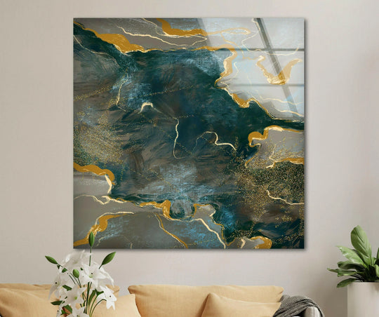 Green and golden alcohol ink glass wall art features a captivating layering effect with translucent inks and shimmering gold accents.