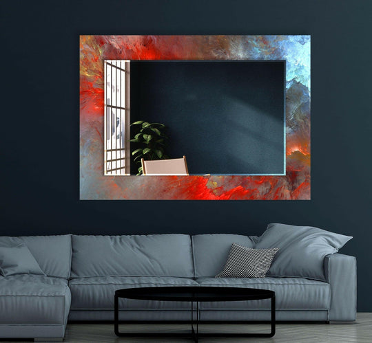 A horizontal lighted bathroom mirror features a vibrant red and blue abstract pattern with bold modern design elements