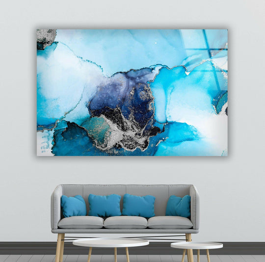 Layers of sapphire, azure, and deep navy blend with shimmering silver in this unique modern wall decor glass art print.