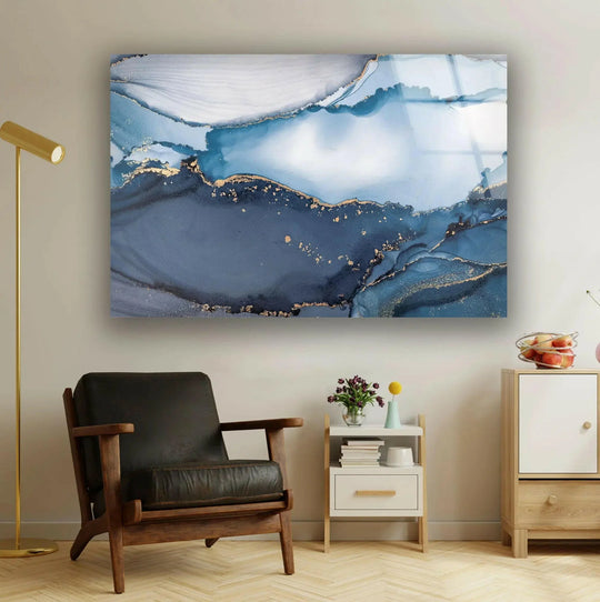 Tranquil navy and gold abstract glass wall art evokes a serene and sophisticated mood.
