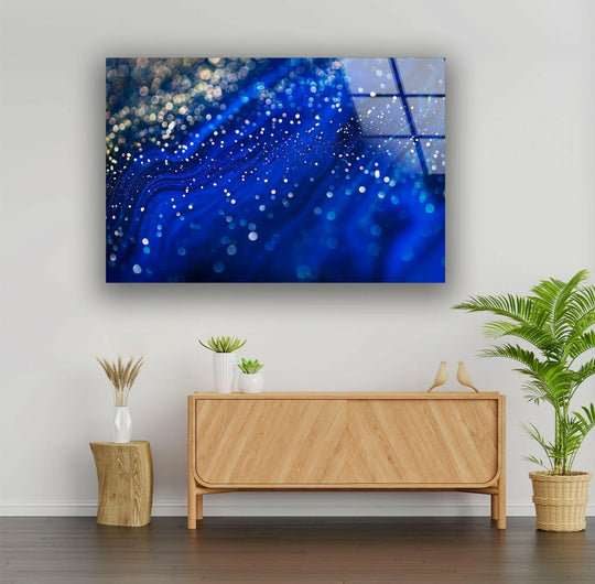 Deep blue, shimmering abstract glass wall art showcasing luminous, layered bokeh effects.