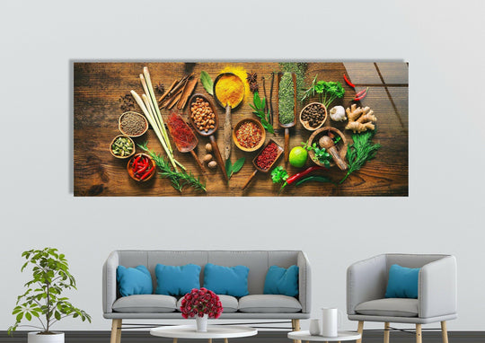 Vibrant color contrast highlights the natural hues of herbs and spices in this glass wall art, providing an eye-catching home decoration to any kitchen setting.