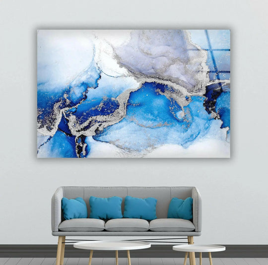 Stillness captured in a serene abstract glass art painting with flowing blues and shimmering silver accents.