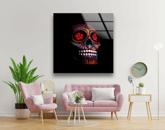 A vibrant sugar calavera skull on black negative space is stunning art from glass.