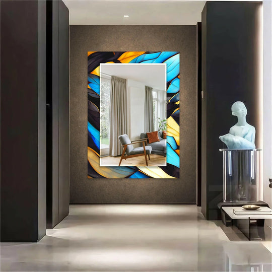 The wall mirror has blue decorative patterns and a black frame and is black frame mirrors and elegant wall decor with vibrant colors on a wall