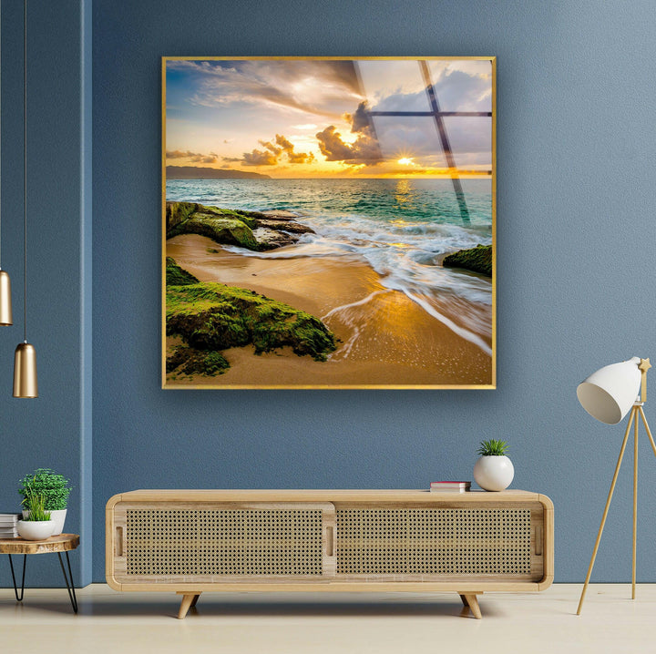 Ocean waves meeting the shore at sunset, with a stunning blend of warm and cool tones.
