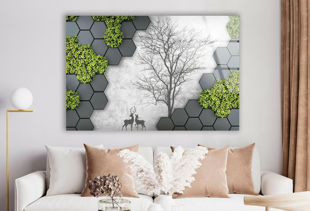 Stylish hexagonal pattern glass artwork with green details and a tree silhouette.
