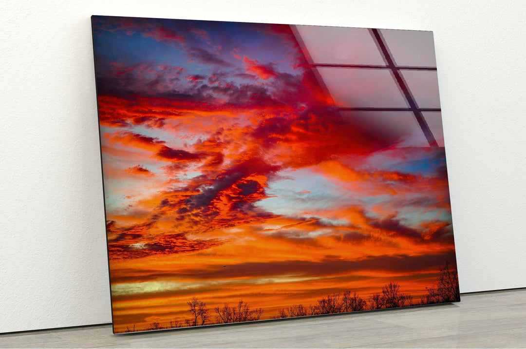 A dramatic sunset sky with intense fiery hues, creating a mesmerizing view.
