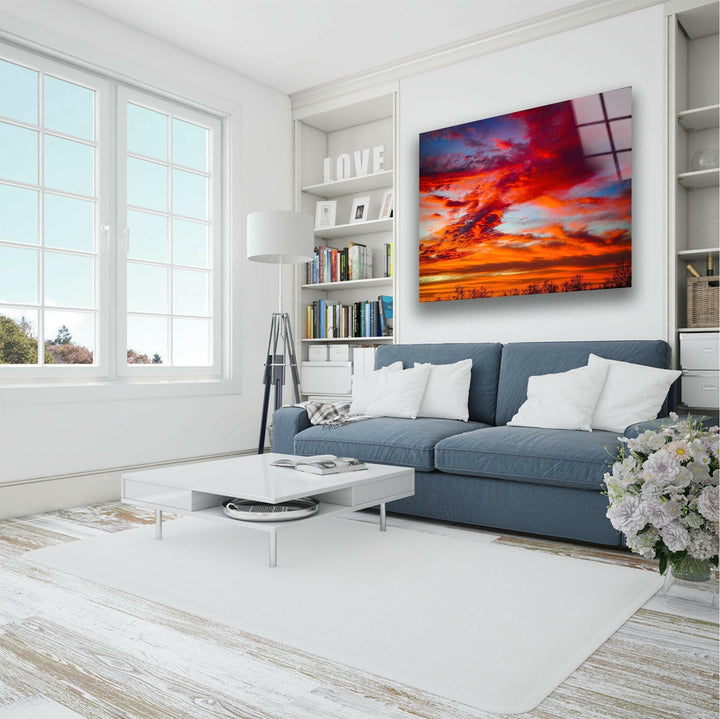 A panoramic sunset sky with rich, deep colors creating a stunning visual effect.
