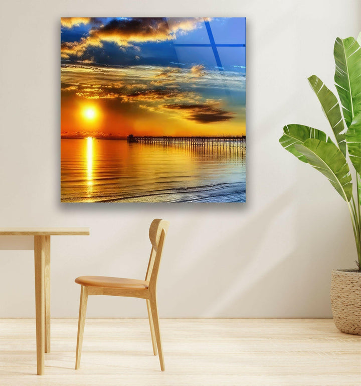 Fiery Sky and Pier Reflections – A Stunning Coastal Glass Artwork
