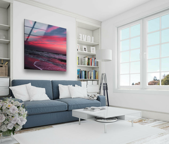 Luxury home decor with a vibrant ocean sunset and deep twilight colors on glass.
