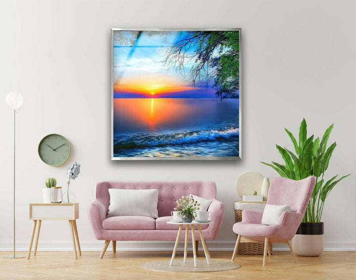 Tropical shoreline with a warm sunset glow and gentle surf, transformed into glass wall art.
