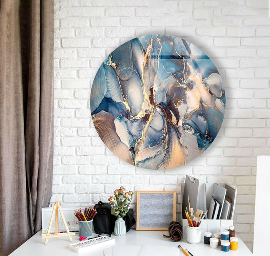 The swirling organic forms of blue marble pattern round art from glass are showcased in this elegant wall art.