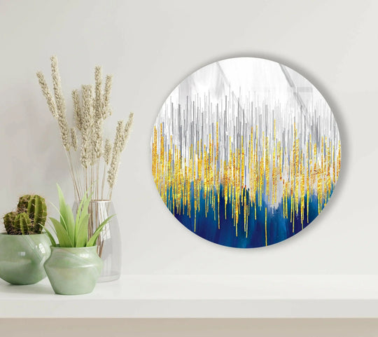 Stillness emanates from the gold details with blue abstract round glass wall art through professional glass printing, complemented by serene potted plants.