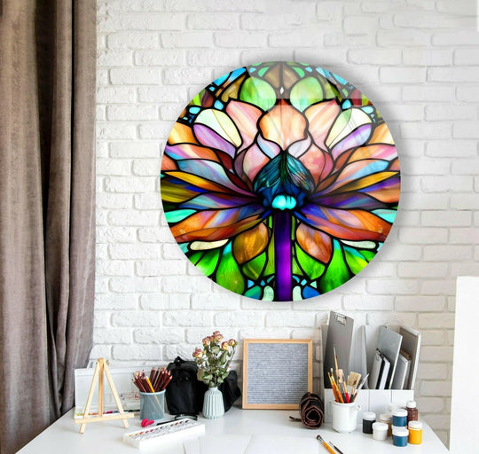 Behind the stained round lotus glass wall art, a textured white brick wall contributes to the home decoration, contrasting with the colorful, floral glass art piece.
