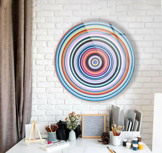 Smooth and glossy finish enhances the concentric circles of this pink spirals abstract round art from glass wall art piece.