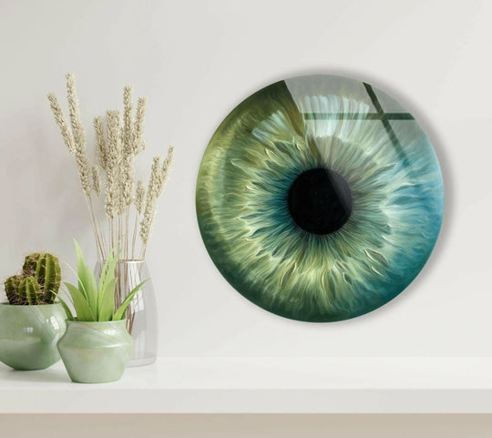 Visual rhythm is created by the swirling concentric patterns within this green eye round glass wall art decor, drawing the viewer inward.