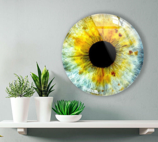Dominant gold highlights the striking Colored Eye Round glass art, showcasing its vibrant colors and unique design as a stunning piece of glass art.