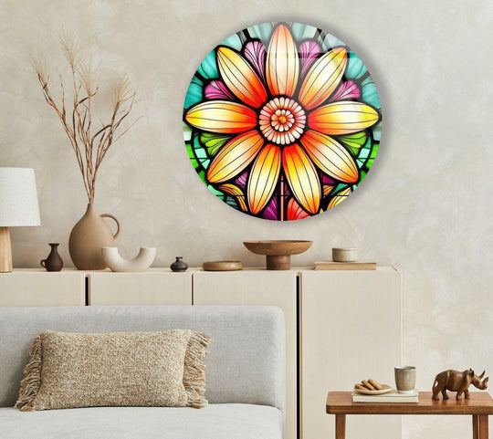 Stillness of the room highlights the vibrant orange stained flower round glass print wall art, a captivating focal point above the minimalist furniture.