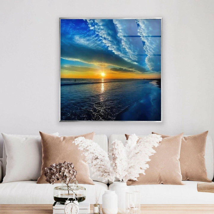 Luxury glass artwork capturing the beauty of a dramatic sky with a glowing sunset.
