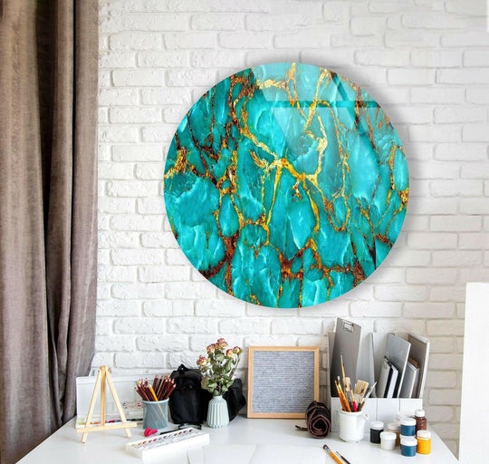 Flowing beige curtain is the softest element against the luxurious green marble with gold veins round glass art painting, a circular statement piece for modern decor.