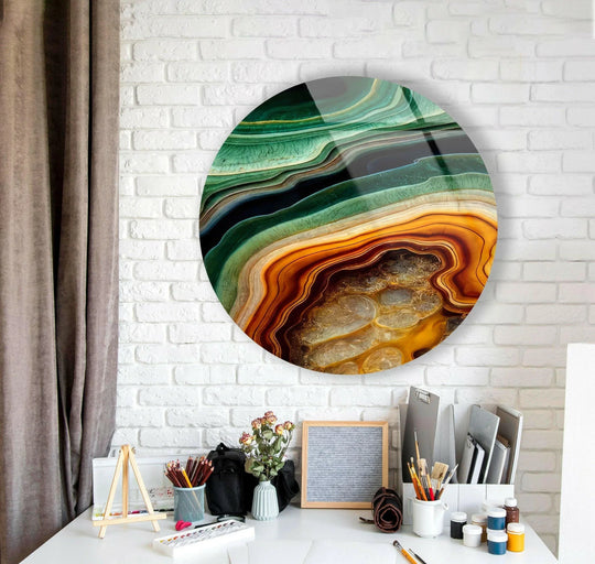 Intriguing depth and layers define this green and gold marble round tempered glass wall art, creating a captivating visual experience with its earthy tones.