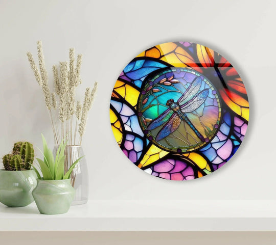 Dominant yellows, blues, and purples highlight the stained dragonfly round glass wall art, making it one of the best glass art pieces for vibrant decor.