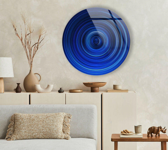 High-quality glass showcases the modern blue lines of this round wall art, making it a unique modern wall decor piece that brings contemporary style.