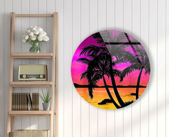 Foreground palms and their reflections anchor the tropical sunset scene in this piece of glass wall art decor, creating a striking focal point.