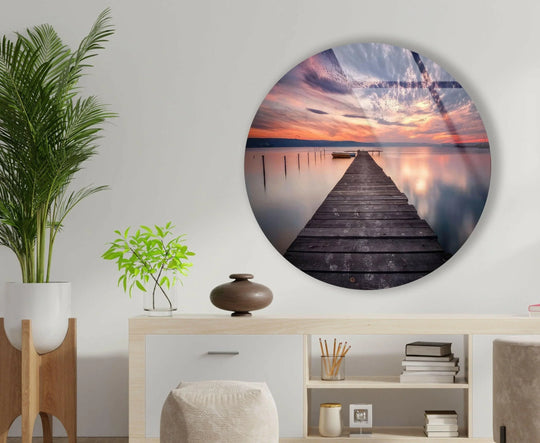 Deep layers are enhanced in this purple sunset lake view glass wall artwork through the perspective of the wooden dock receding into the serene water.