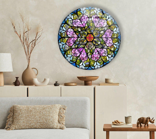 Circular edge of the stained round pink flowers glass wall art decor is accented with a dark border, enhancing its floral mosaic design.
