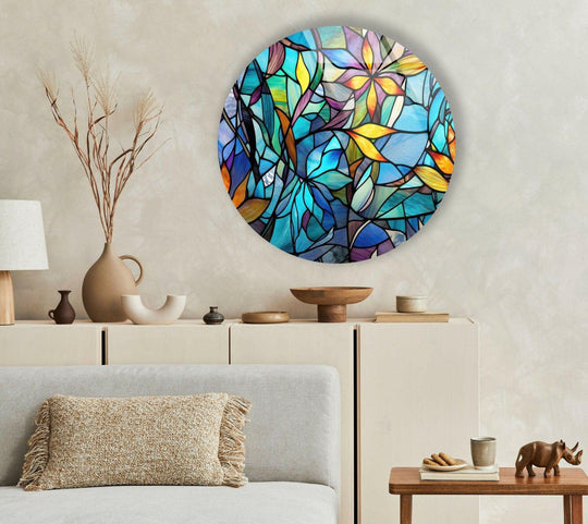 Central subject is a round stained glass wall art piece showcasing decorative wall art with vibrant floral patterns in hues of blue, yellow, and purple.