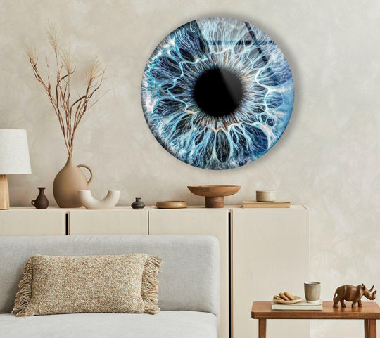 Intricate depth and layers define this striking blue eye round glass wall artwork, showcasing an intense gaze with detailed irises and a mesmerizing design.