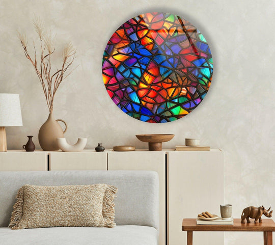 Vibrant, stained glass printing art is the loudest element in this stained round blue and red glass wall art, radiating color and light.