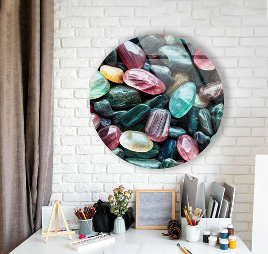 Hues of colorful zen spa stones create a soothing focal point in this round glass art, providing a tranquil and modern glass art accent.