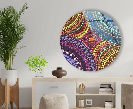 Featuring an abstract quality, this round glass wall artwork presents the 'Colored Dots' design as vibrant, concentric circles in a contemporary style.