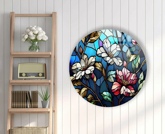 Subtle light and shadow play across this round stained white magnolia glass wall art, showcasing the best glass art with its rich, colorful floral design.