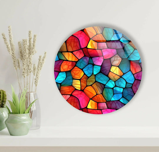 Dominant hues of red, orange, and blue create a vibrant, mosaic-like effect in this colorful modern stained round tempered glass wall art.