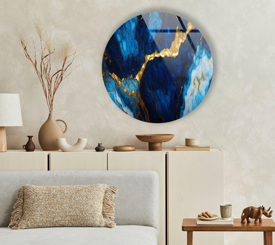 The realistic detail in this royal blue and gold marble round glass wall art offers a luxurious home decoration to complete elegant interiors.