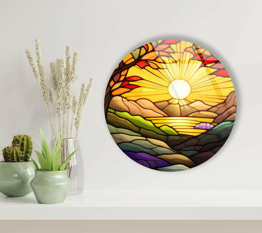 Against a white wall, a sunrise stained round glass wall art piece provides unique modern wall decor, showcasing a stylized landscape with vibrant colors.