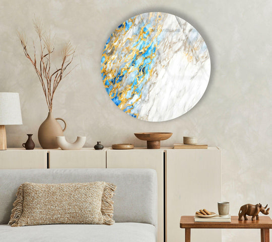 Highly saturated blues and golds create a luxurious visual impact in this elegant marble pattern, achieved through high-quality glass printing on round wall art.