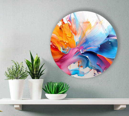 Warm oranges transition into cool blues in this round abstract glass wall art, offering a balance of color temperature for a unique modern wall decor piece.